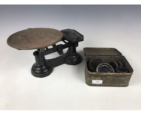 A set of vintage kitchen scales with weights
