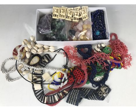 Costume jewellery and loose gemstone beads, including a mother of pearl bracelet (a/f), a carved bone bracelet and sundry bea