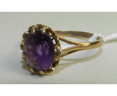 A 9ct gold single stone Amethyst dress ring