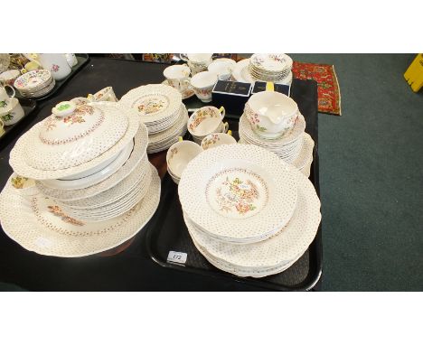 A Royal Doulton 'Grantham' pattern part service, to include tea cups and saucers, bowls and plates of various sizes, together