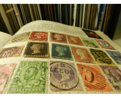 A stamp album containing British, Commonwealth and European stamps, to include a Penny Black, German and Italian States, etc.