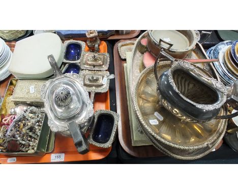 Silver plated wares including a part tea service, bottle coaster, pink guilloche enamel three piece brush/mirror set, a pierc