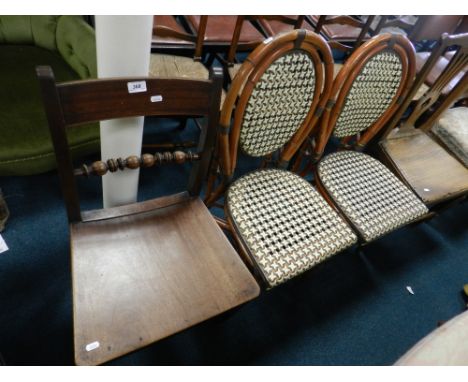 A pair of bamboo conservatory chairs and an early 19th century mahogany panel seat chair with bar and bobbin turned back.