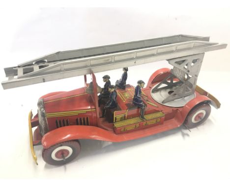 A Mettoy Tinplate Clockwork Fire Engine.