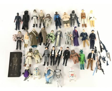 A Collection of Vintage Star Wars Figures including some of the Last 17. Some with Weapons.
