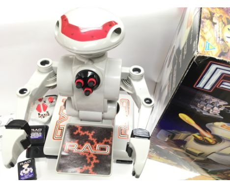 A Boxed R.A.D. Radio Controlled Robot. Approximately 48cm in height. Contains Battery pack and Control.