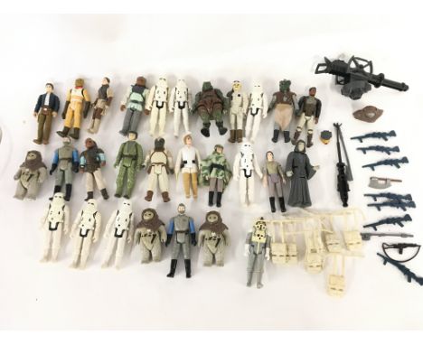 A Collection of Vintage Star Wars Figures and Accessories.