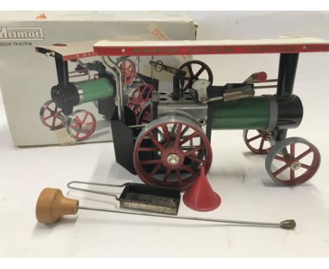 A Boxed Mamod Steam Tractor.