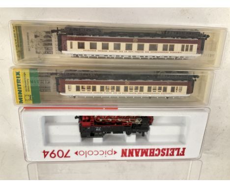 A Boxed Fleischmann N Gauge 0-10-0 tank #7094 With 2 Minitrix Coaches.