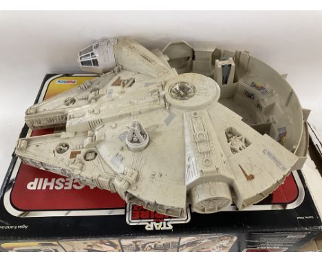 Vintage Palitoy Star Wars Boxed Milenium Falcon Playworn with parts missing including original leaflet.