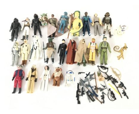 A Collection of Vintage Star Wars Figures including some of the Last 17. Some with Weapons.