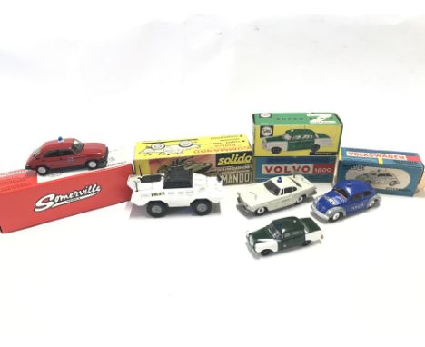 A Collection of Boxed Die Cast Converted into police Vehicles. Including Metosul. Solido and Somerville.