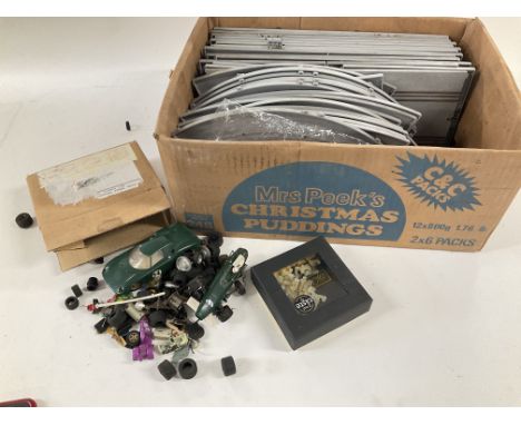 A Box Containing Vintage Scalextric track and parts. No Reserve.