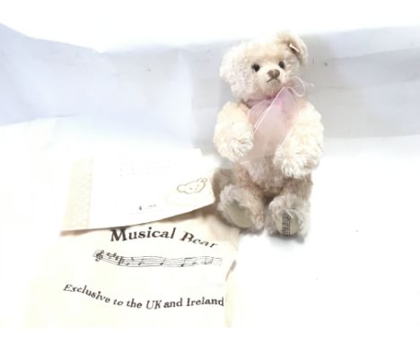 A Steiff Musical Bear Playing Candle in the wind. With bag and Certificate.