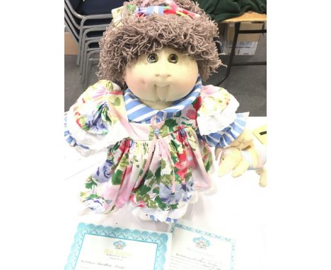 A Large. Cabbage Patch Kids Doll. Anne Marie Kristyn 1988. With certificates. Approximate height 56CM. With stand. Signed by 
