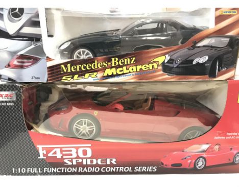 2 X Remote Controlled Cars. A Ferrari F430 Spider. And a Mercedes Benz SLR McLaren. Boxed.