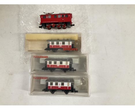 A Fleischmann N Gauge Rack Locomotive with 3 Coaches.