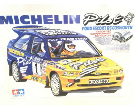 A Boxed Michelin Remote Controlled Ford Escort R/S Cosworth.