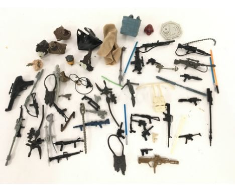 A Collection of Mostly vintage Star Wars Guns and accessories.
