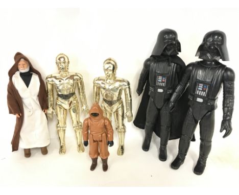 A Collection of Vintage 12 inch Star Wars Figures.