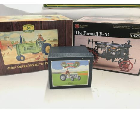 3 X Boxed Tractors including Precision Series Farmall F-20. Franklin Mint John Deere Model B Tractor and a Britains TE Tracto
