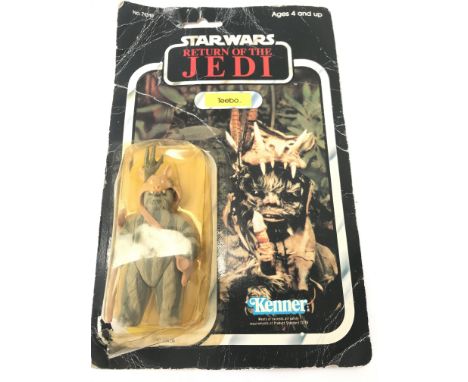A Vintage Star Wars Return Of The Jedi Carded Teebo Figure.79 Back. Card is Worn and Blister Is Damaged.