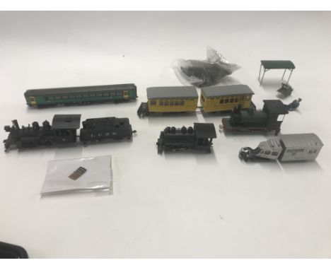 Coleion of loose ngauge railway models and accessories including 4 engine, coaches and sundries
