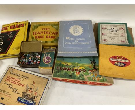 A. Box Containing Vintage Board Games and A Small collection of Marbles.No Reserve.