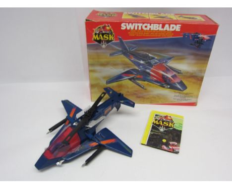 A Kenner Mask Switchblade Venom helicopter/aeroplane with action figure, in original box. Includes instruction manual. 