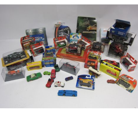 A collection mixed boxed, carded, perspex cased and loose diecast vehicles including Matchbox Superfast, Hero City, Hot Wheel