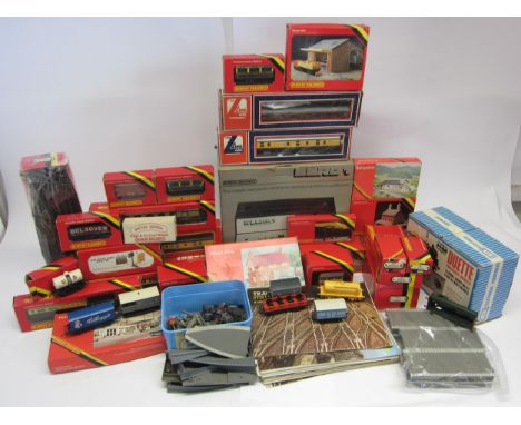 A collection of predominantly Hornby 00 gauge model railway rolling stock, buildings, track, accessories, two boxed Lima coac