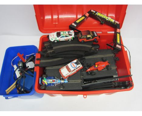 A collection of loose and playworn slot racing cars, track and accessories including Scalextric and SCX 
