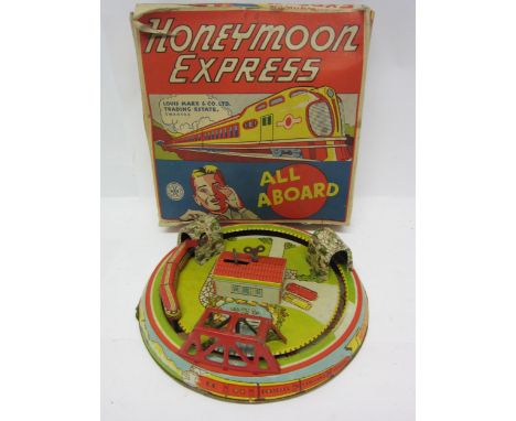 A boxed Marx Honeymoon Express clockwork tinplate toy 