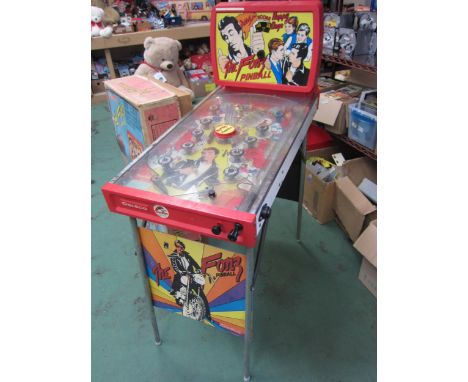 A boxed 1970's Coleco no.6005 "The Fonz" Happy Days electric pinball table raised on metal legs, 126cm tall 