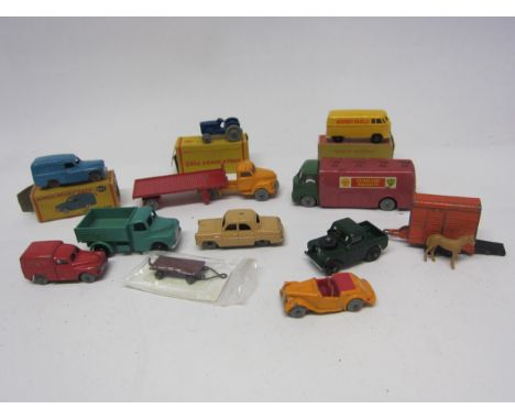 Three boxed Dinky Dublo '00' scale diecast vehicles to include 069 Massey Harris Tractor, 063 Commer Van and 071 Volkwagen De