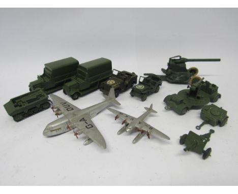 A collection of Dinky Toys military diecast vehicles to include 151b 6-Wheel Covered Wagon (x2), 162b Ammunition Trailer, 162