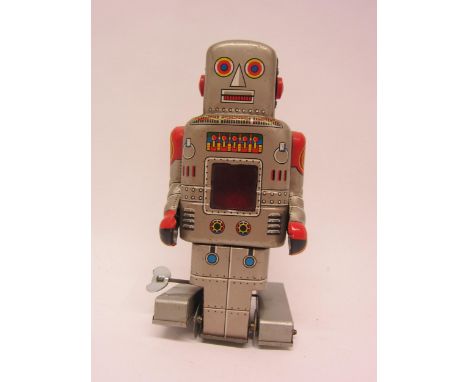 An SY Toys (Yoneya), Japan, tinplate clockwork robot with spark action, 16.5cm tall 