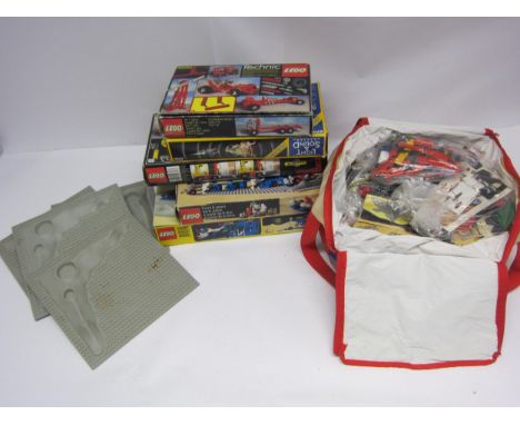 Five boxed Lego sets (contents unchecked) to include 6780 Light and Sound System, 920 Alpha Rocket Base, 6971 Legoland Inter-