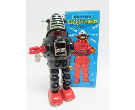 A KO (Yoshiya), Japan, Action Planet Robot, the black tinplate robot with red plastic arms and feet, silver grille and antenn