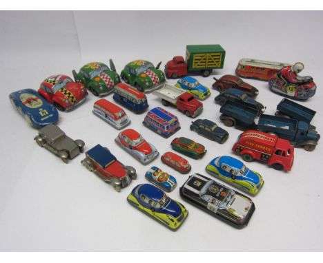 A group of assorted tinplate vehicles including Japanese VW Beetle style racing cars, Biller Toy (Germany) Bluebird style lan