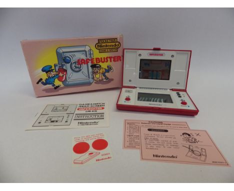 Nintendo Game &amp; Watch Multi Screen Safebuster handheld electronic game (JB-63), in original box, Number 46288416. Box has