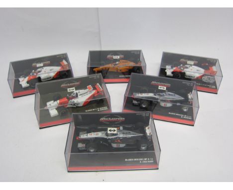 A group of six Paul's Model Art Minichamps McLaren Collection  1:43 scale diecast Formula 1 cars, to include McLaren Mercedes