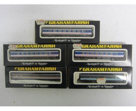 Three boxed Graham Farish N gauge No.0808 Network Southeast passenger coaches and a No.0772 passenger coach in Scotrail liver