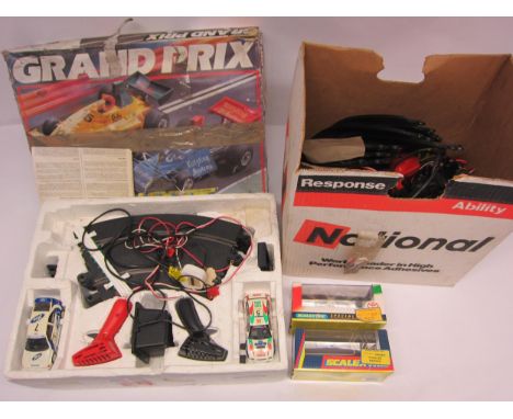 Scalextric Grand Prix slot racing set, spare track and perspex cases 