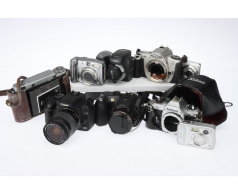 A Mixed Selection of Various Cameras comprising a KMZ Mockba-5 folding rangefinder camera, a Nikon FG 35mm SLR body, a Canon 