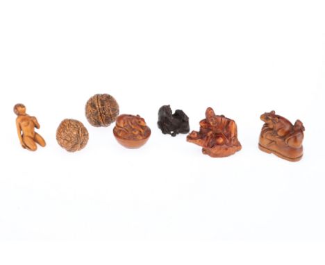 A Good Selection of Wooden Carved Netsuke. various examples with a reclining nude female, horse and more, most with Chinese c