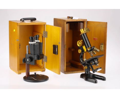 Two Microscopes, including a Bausch &amp; Lomb microscope in a case, finished in black enamel and brass lacquer, and engraved