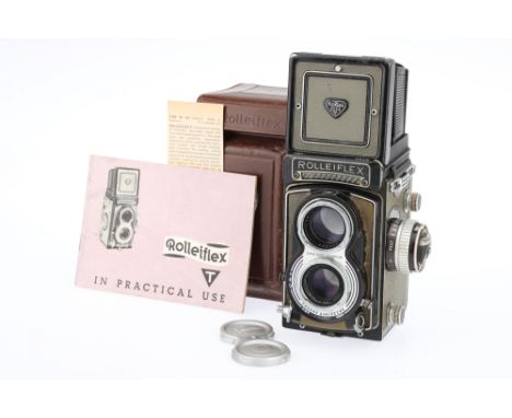 A Rollei Rolleiflex T Model K8 T1 Medium Format TLR Camera 1958-61, grey, serial no.2125801, with a Carl Zeiss Tessar f/3.5 7
