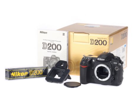A Nikon D200 APS-C Digital Camera, body G-VG, appears to be working at time of auction, with maker's box, manual, charger, &a