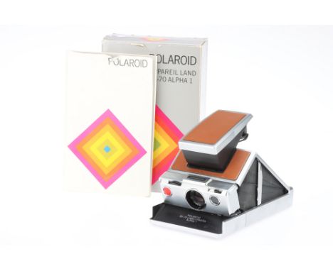 A Polaroid SX-70 Alpha 1 Land Camera, body, G, untested, lens, G, some light internal haze, complete with original box and pa